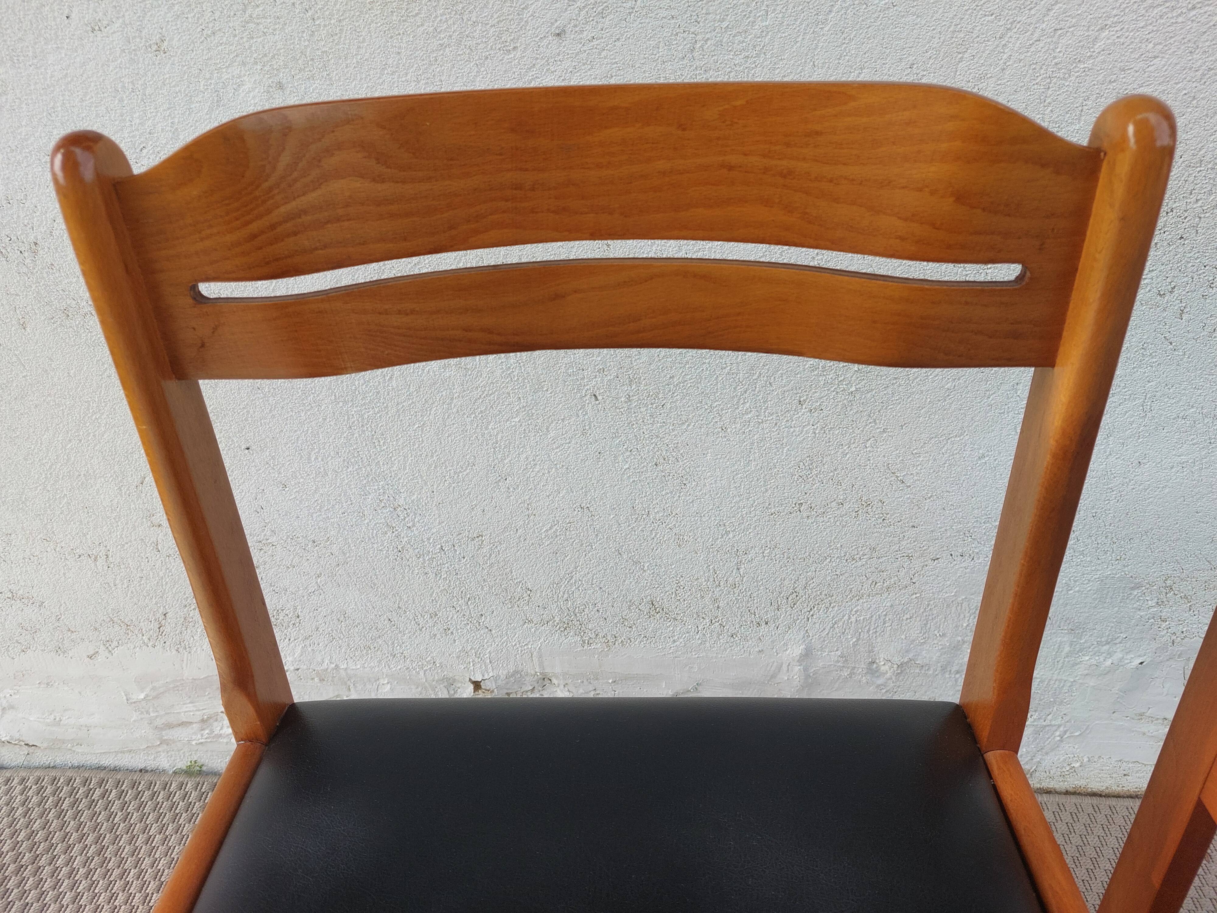 paire de chaises style scandinave, simili cuir noir