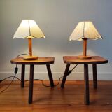 Pair of brutalist tripod stools in solid wood.