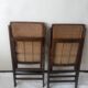 Pair of folding chairs in cane and dark wood