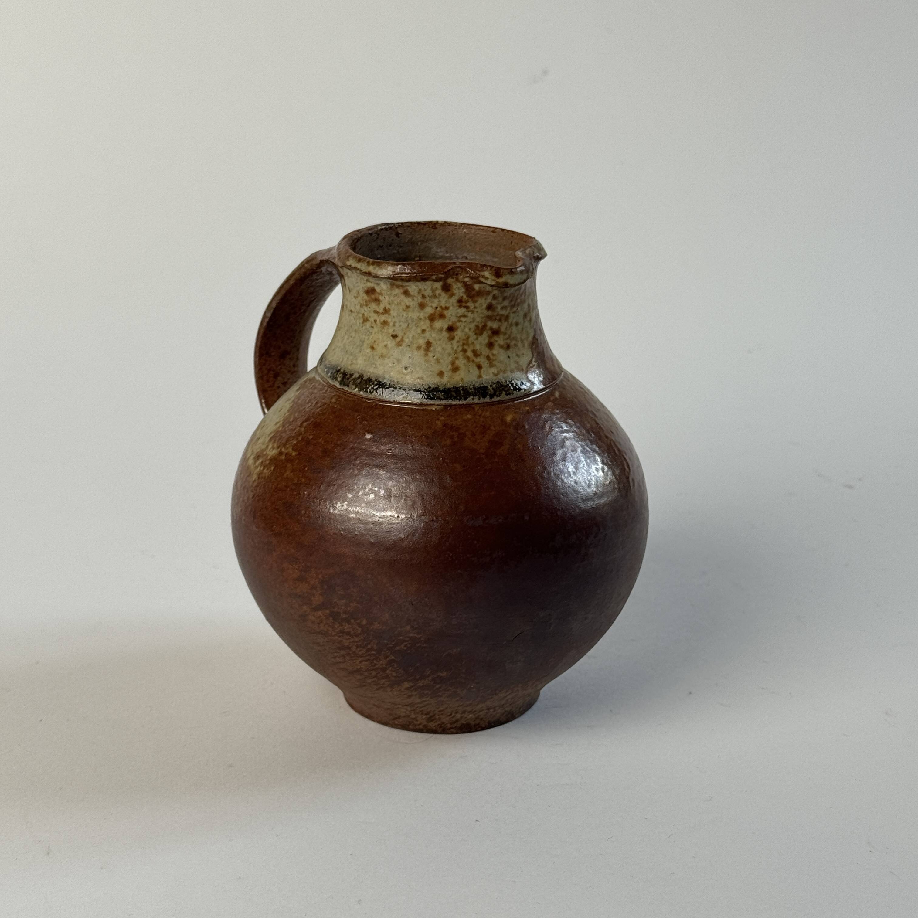 Pair of small Jacky Coville stoneware pitchers, 1970