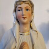 Religious statuette of the Virgin Mary in bisque porcelain