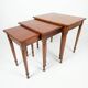Nest of tables in solid cherry wood from the mid-20th century.