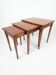 Nest of tables in solid cherry wood from the mid-20th century.