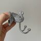 Pair of metal swan wall hooks