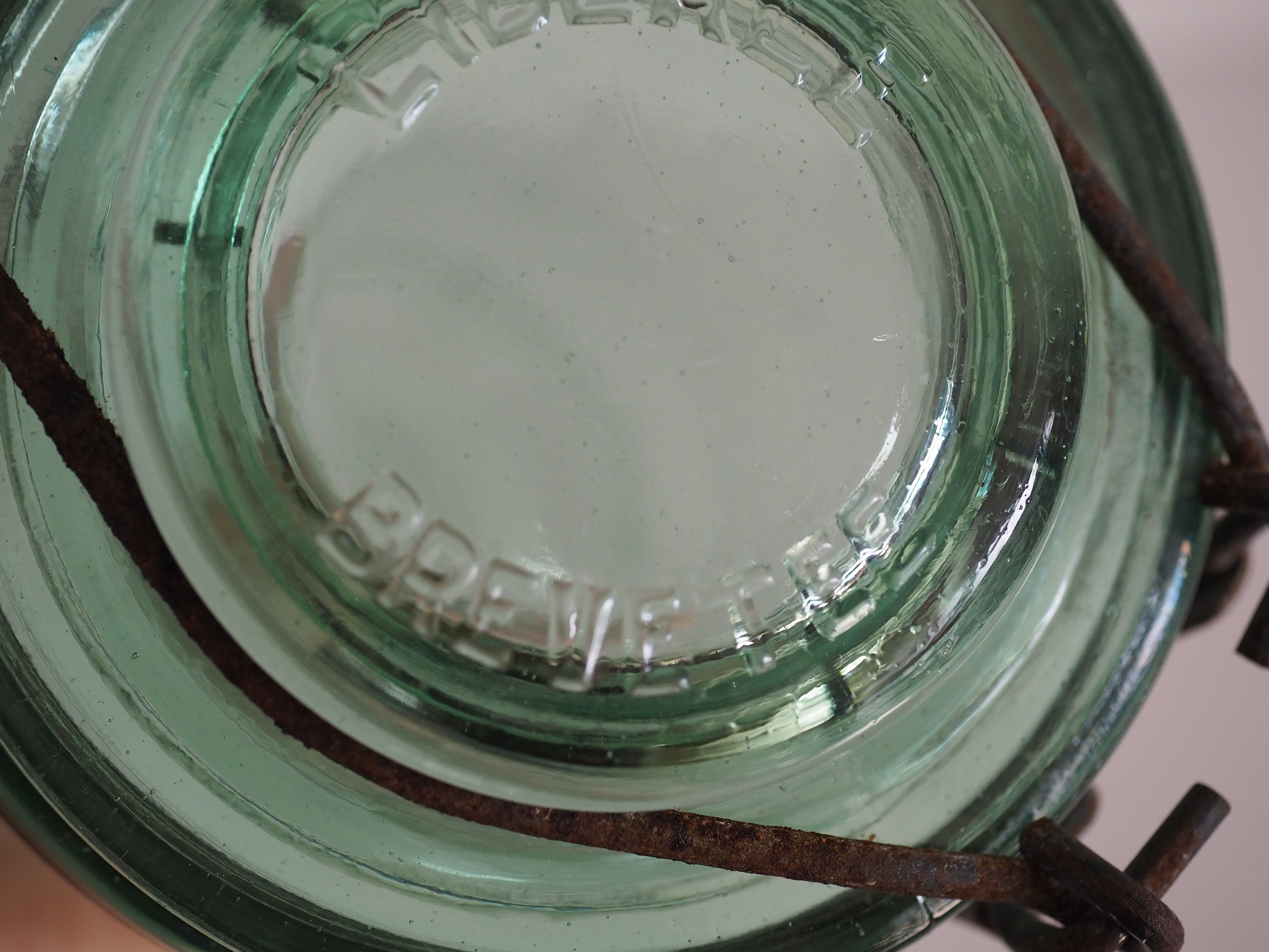 Green "ideale" glass canning jar