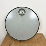 Grey industrial factory wall clock from pragotron, 1960s