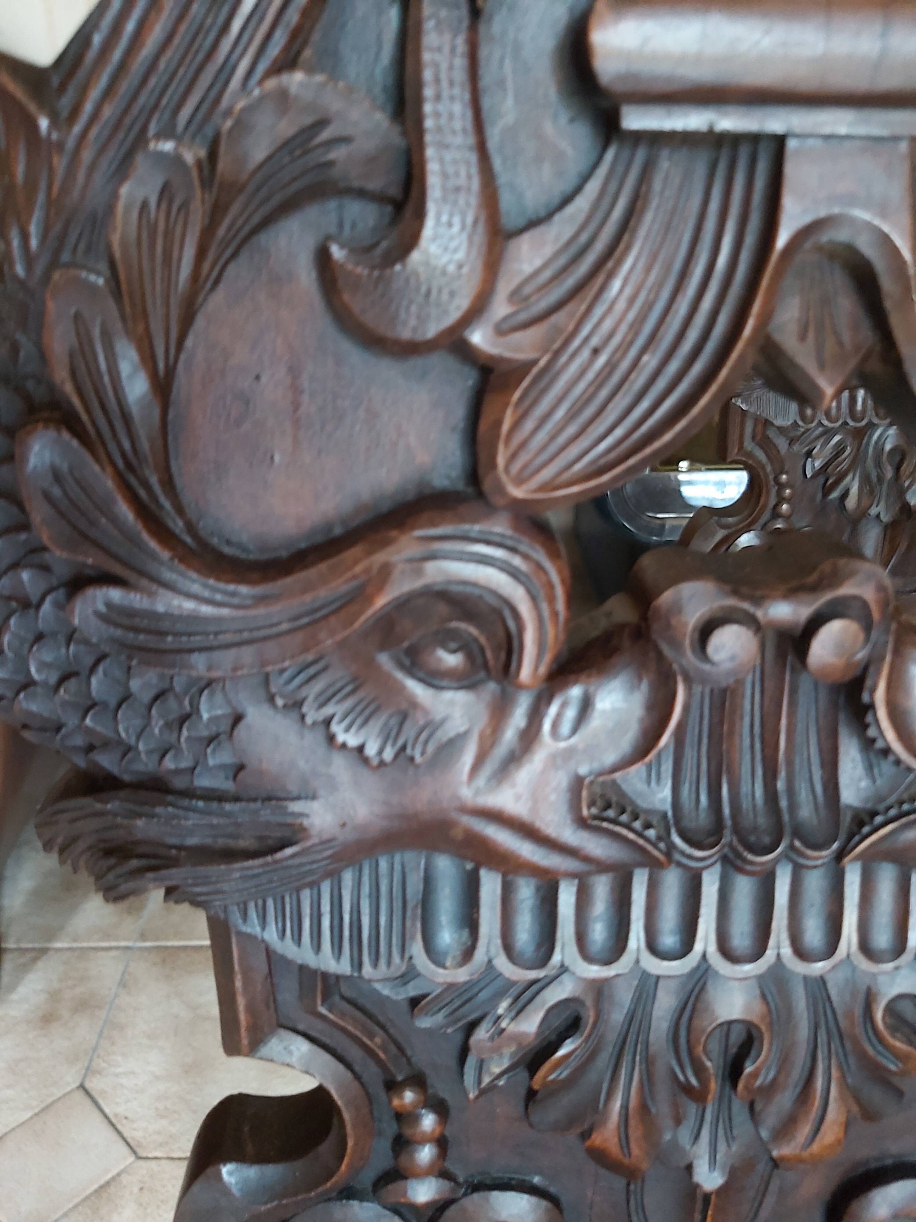 4 stylized dolphin back chairs