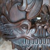 4 stylized dolphin back chairs