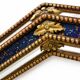 Octagonal wall mirror in cobalt blue eglomisé glass and gilded wood, Spain.