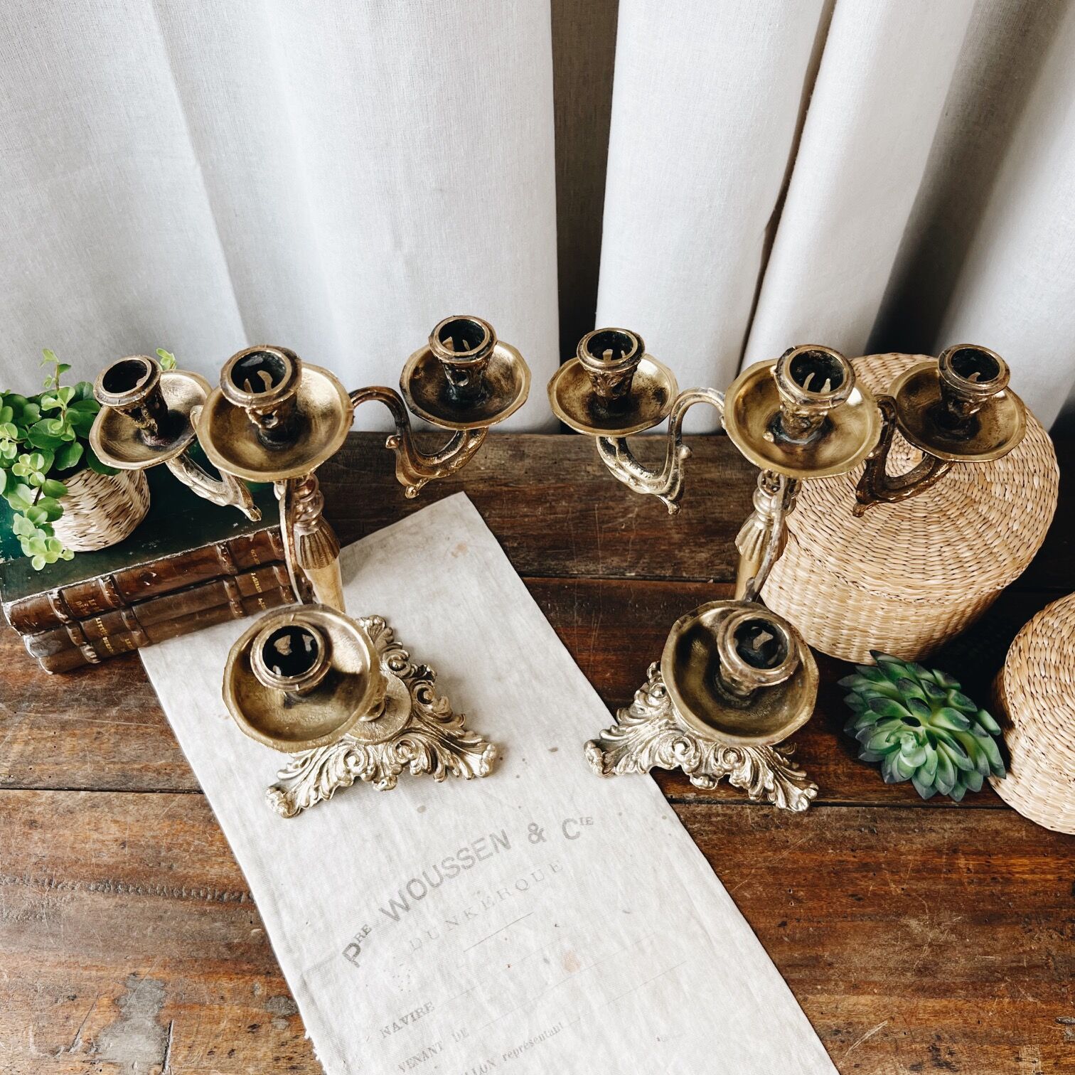 Duo of antique bronze chandeliers