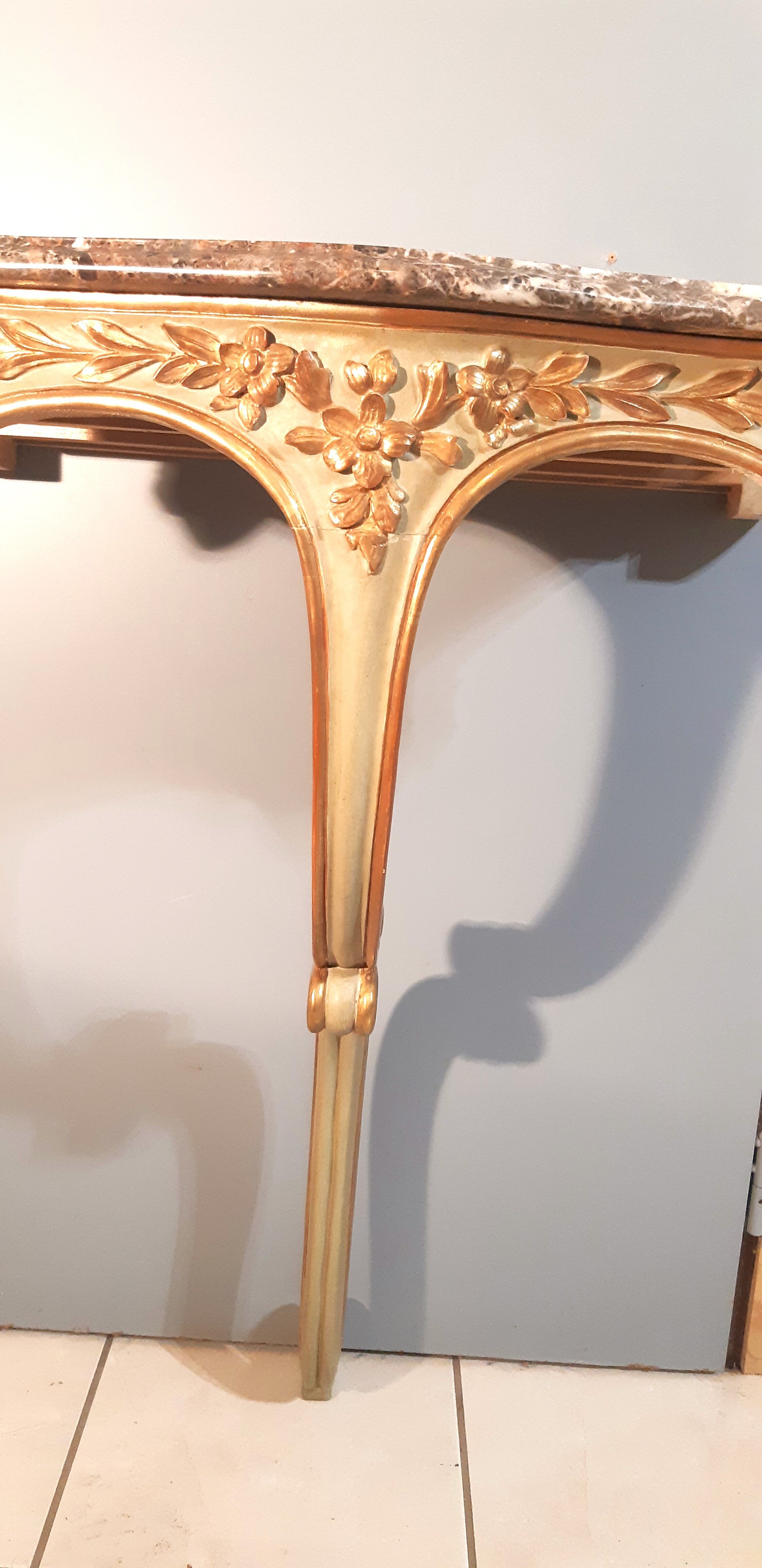 Louis XV style wall lamp console, twentieth century, wood and gilded stucco marble top