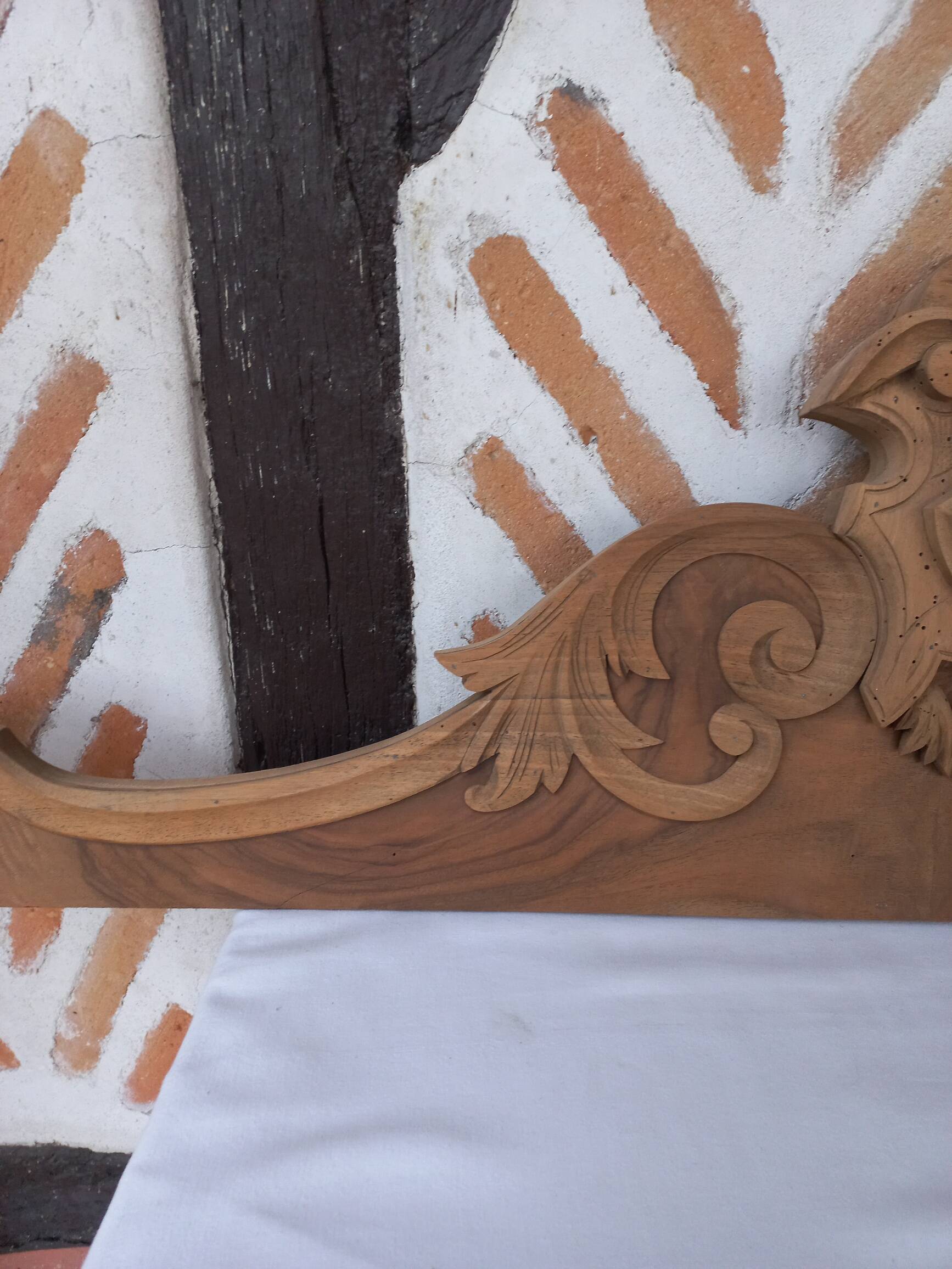 Old sandblasted wooden pediment