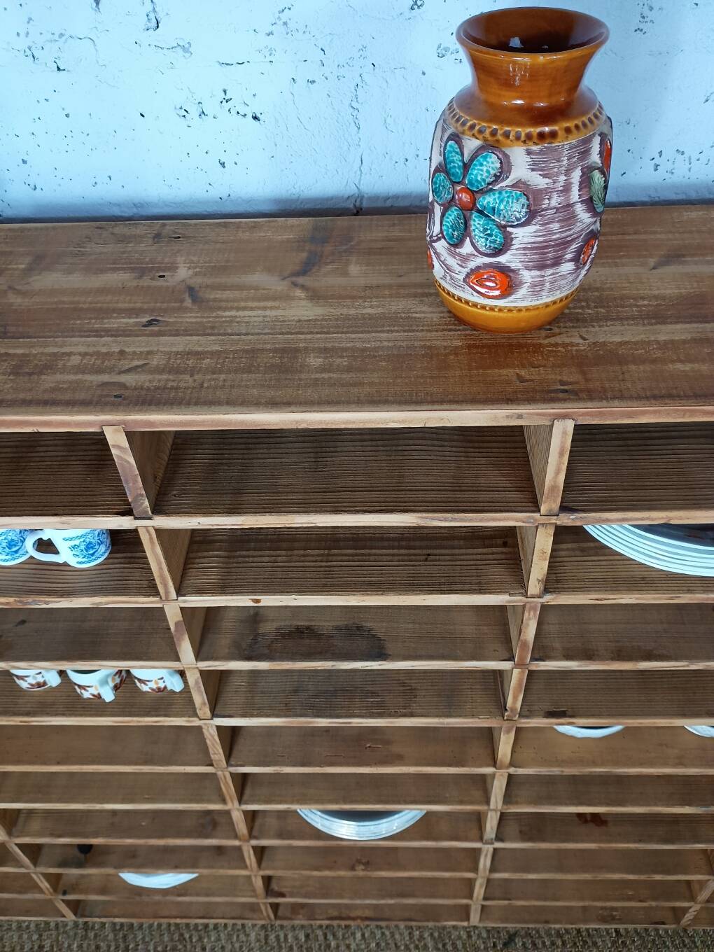 Wooden sorting cabinet with 50 compartments.