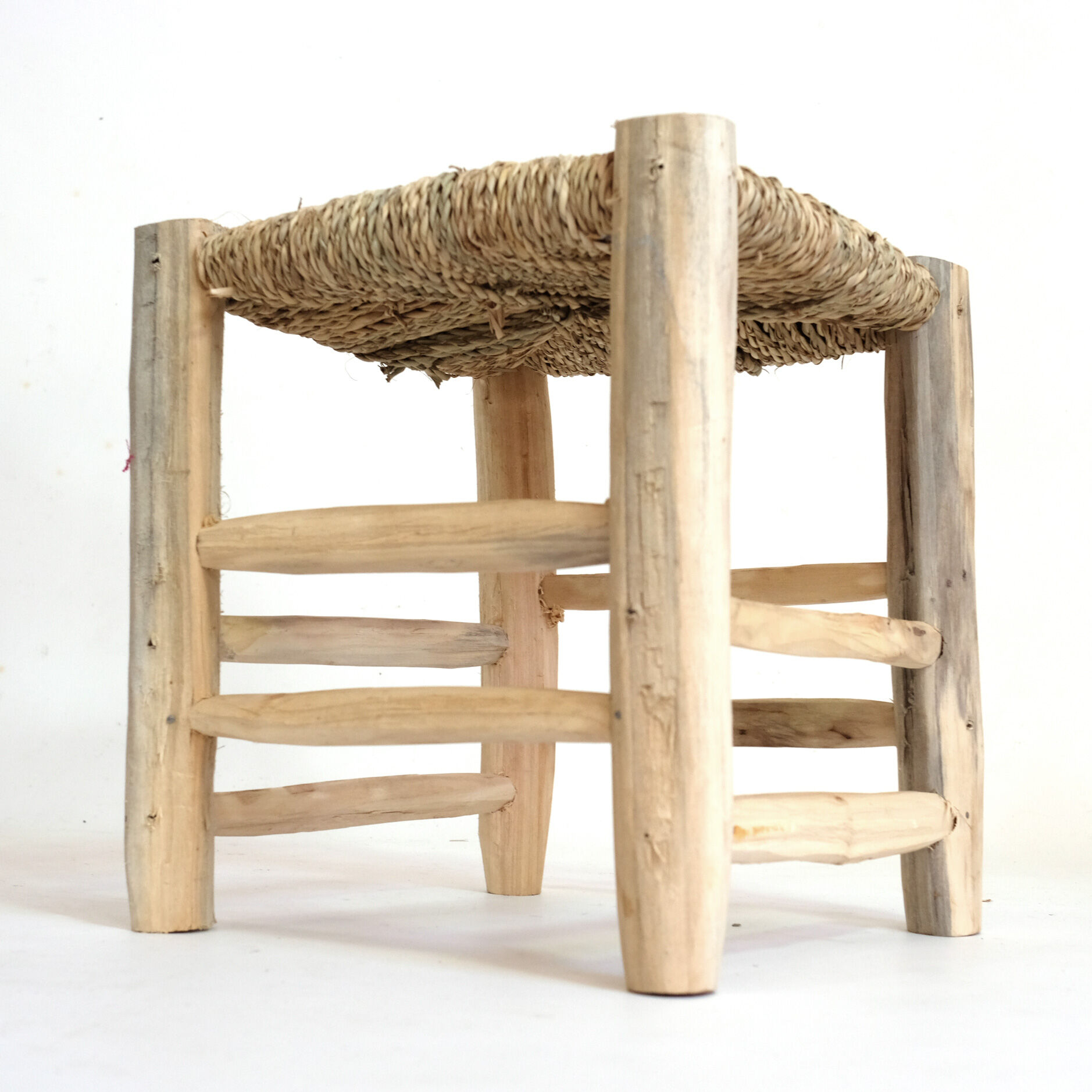 Minimalist stool made of wood and rope