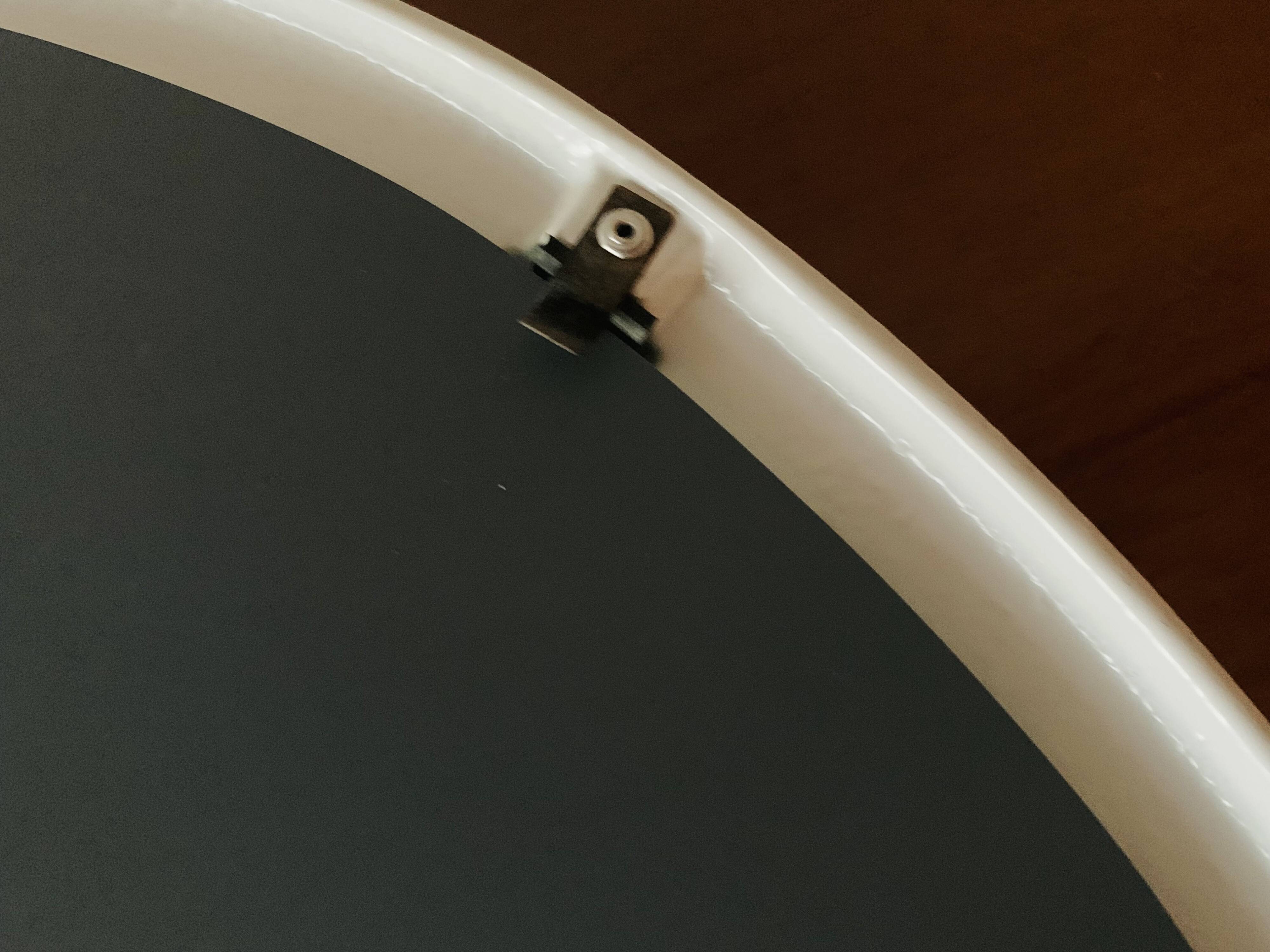 Oval mirror in vintage enameled white cast iron