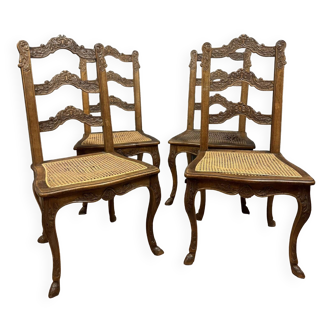 Series of four Louis XV Style chairs with carved wooden cane bases circa 1850