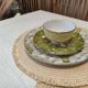 Exotic wood coffee table with its safety glass protection.