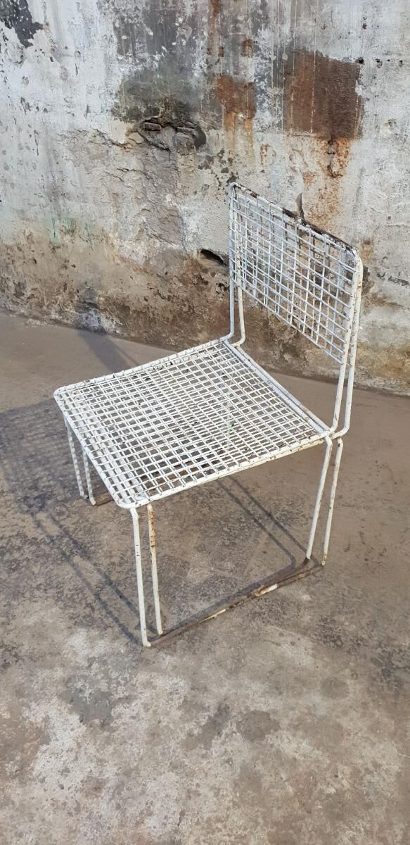 Two vintage metal chairs