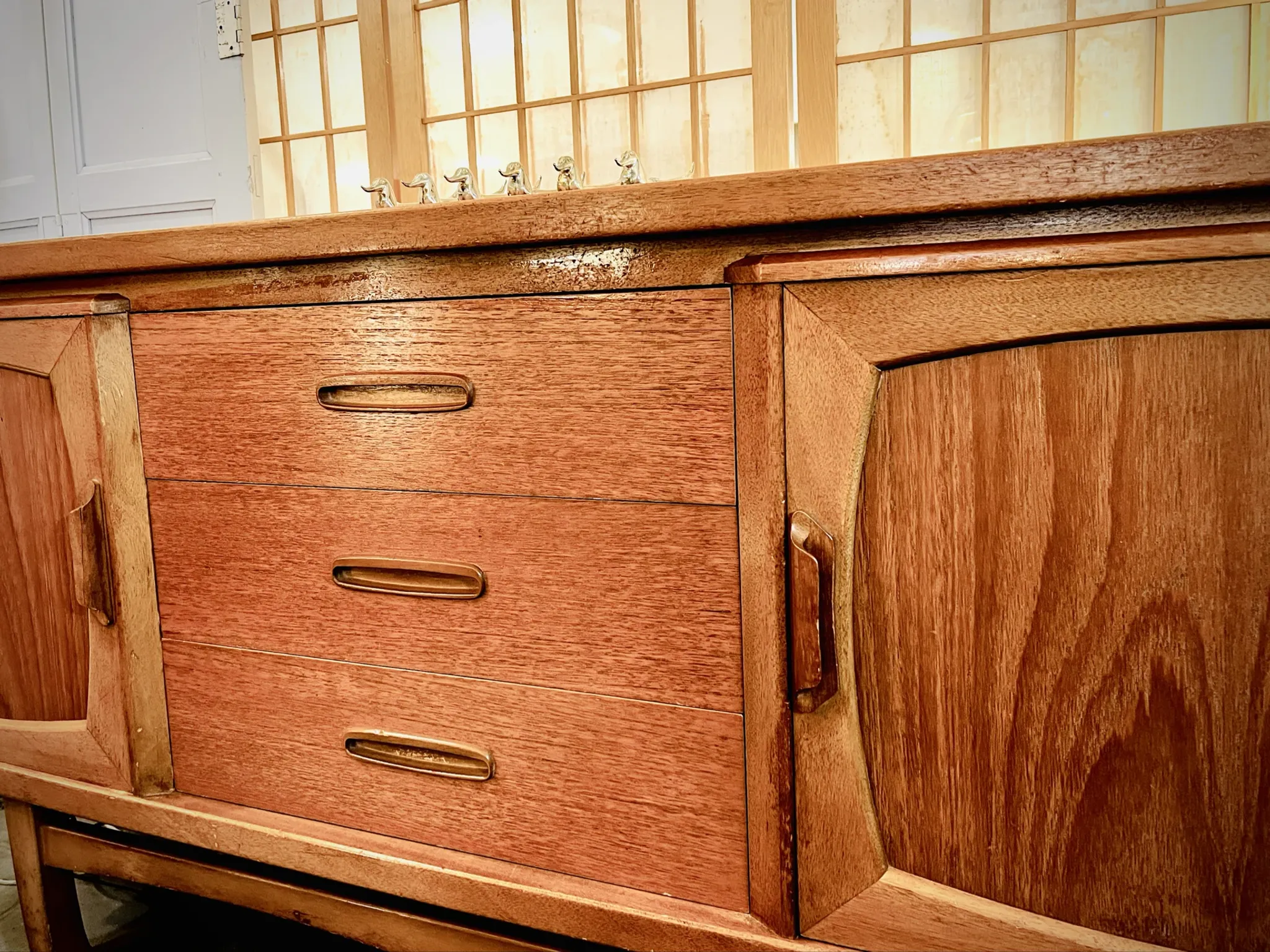 Classic British mid-century teak enfilade, circa 1960s.