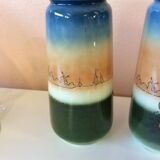 Pair of enamelled sandstone vases