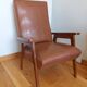 Scandinavian brown skai and wood armchair