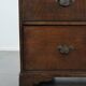 Antique English oak commode dating from the late 18th century.