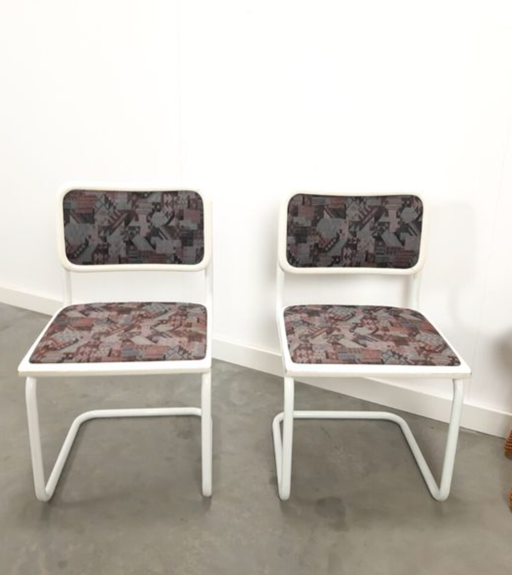 Pair of vintage tubular frame dining chairs