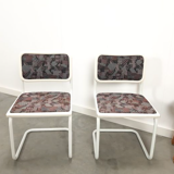 Pair of vintage tubular frame dining chairs