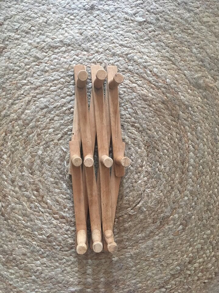 Ten hook coat rack scalable in wood