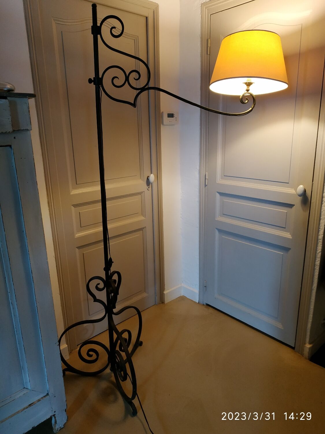 Black wrought iron floor lamp