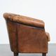 Vintage club chair in sheepskin leather with a characterful look