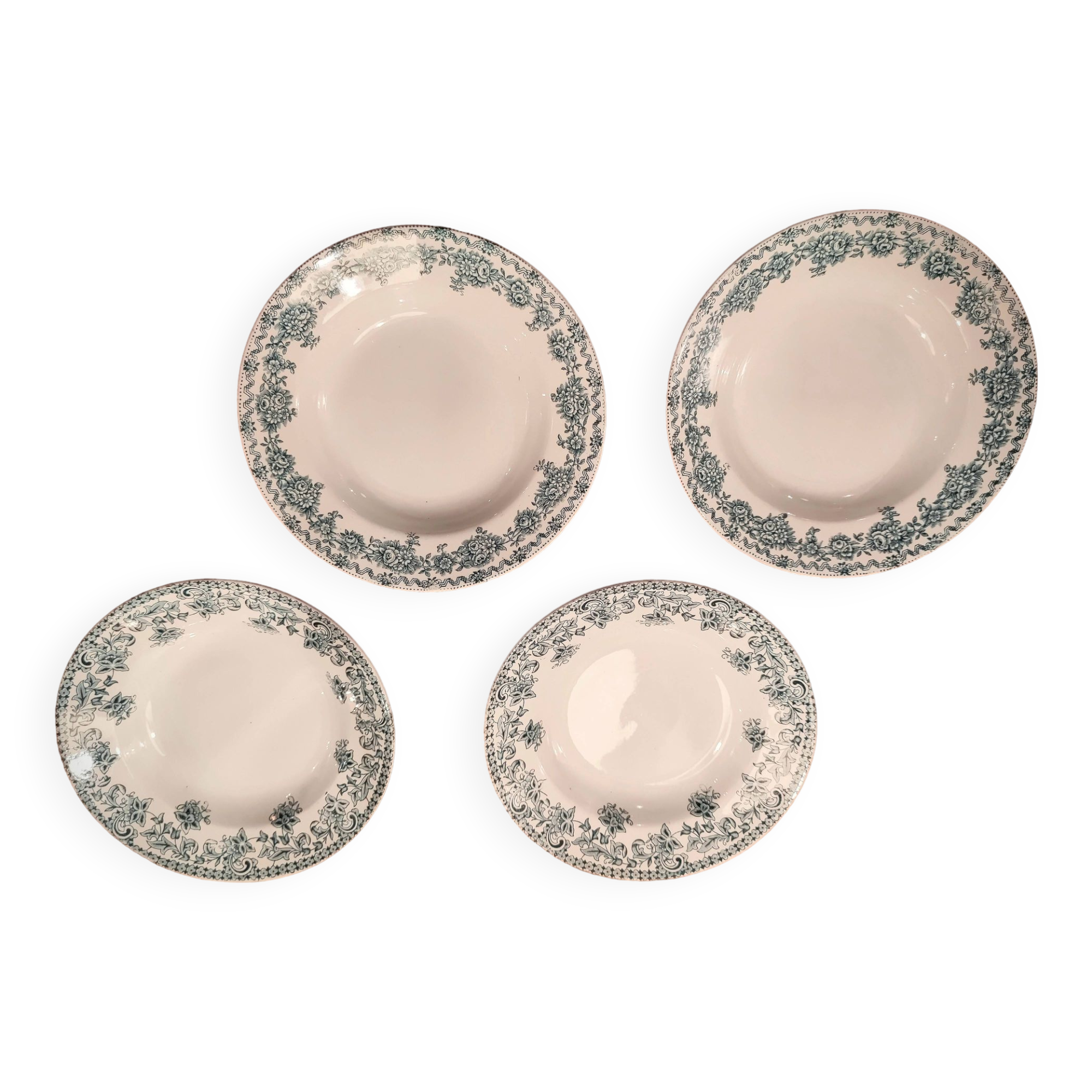 Four Saint Amand plates
