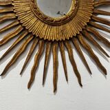 Sun Mirror called Witch's Mirror in gilded wood from the 20s