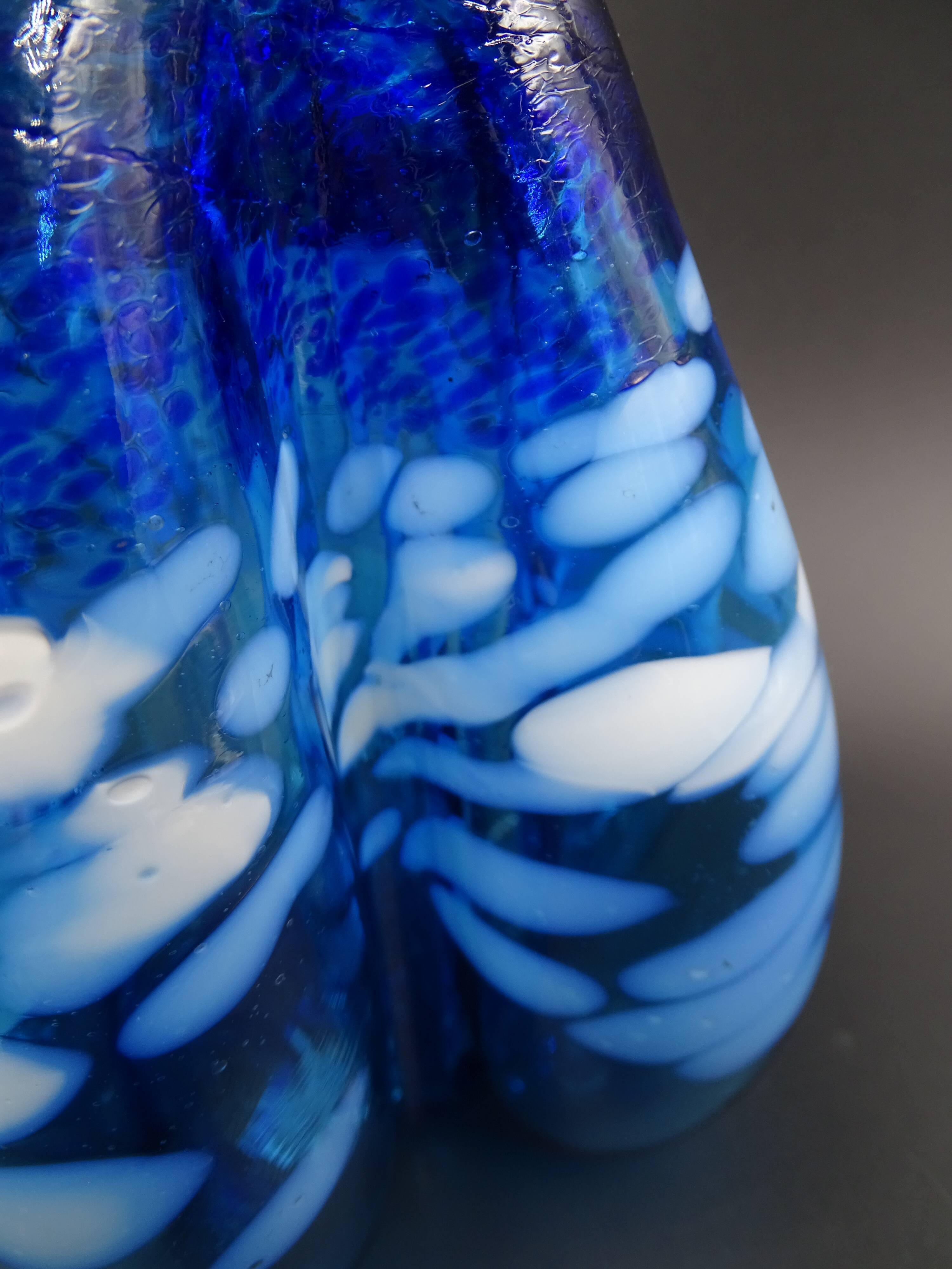 Blue glass vase and touches of white