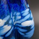 Blue glass vase and touches of white