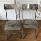 Pair of chrome metal folding chairs