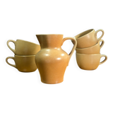 Jug and 5 cups in orange stoneware, very good condition, signed and numbered
