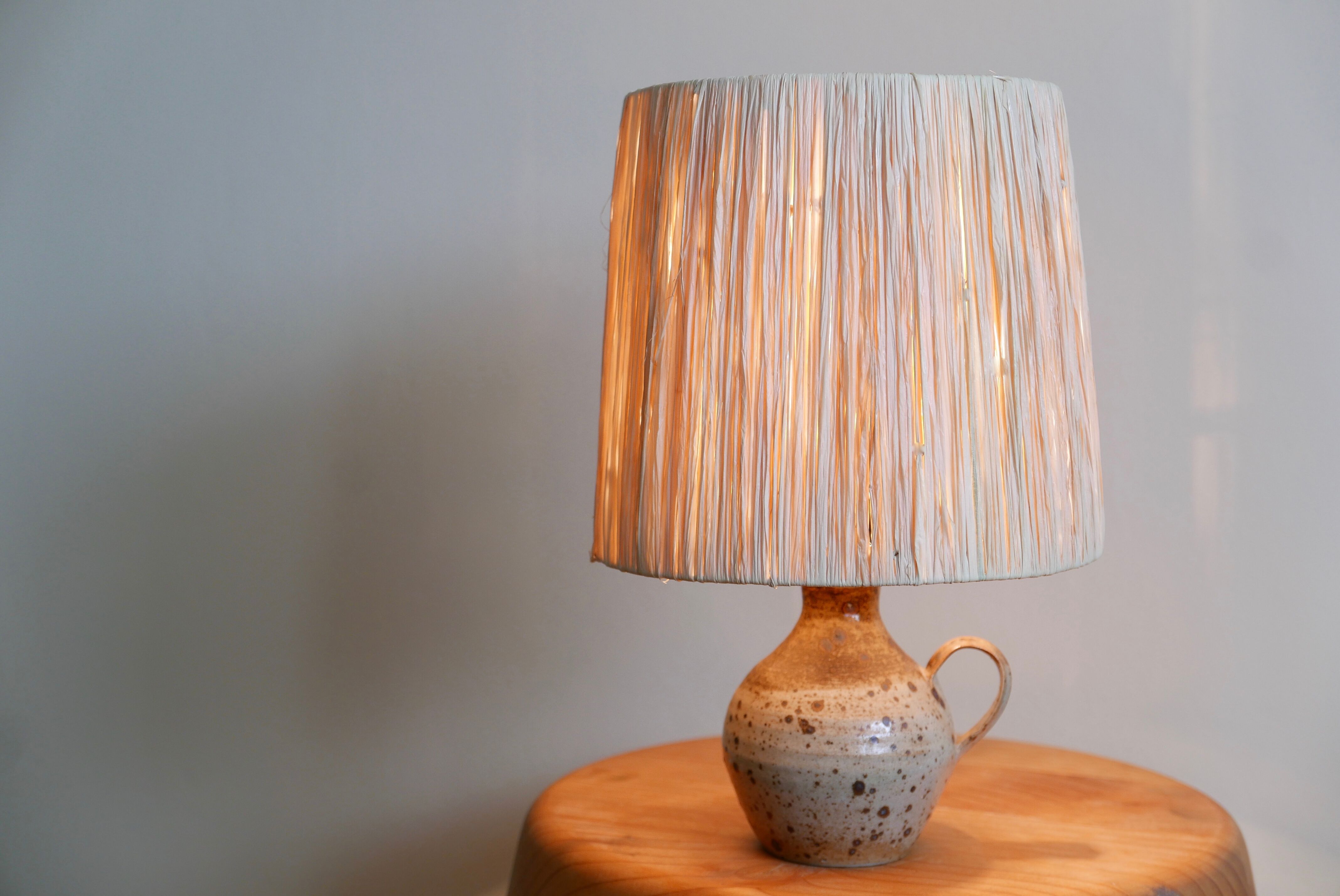Sandstone lamp, raffia lampshade, 60s