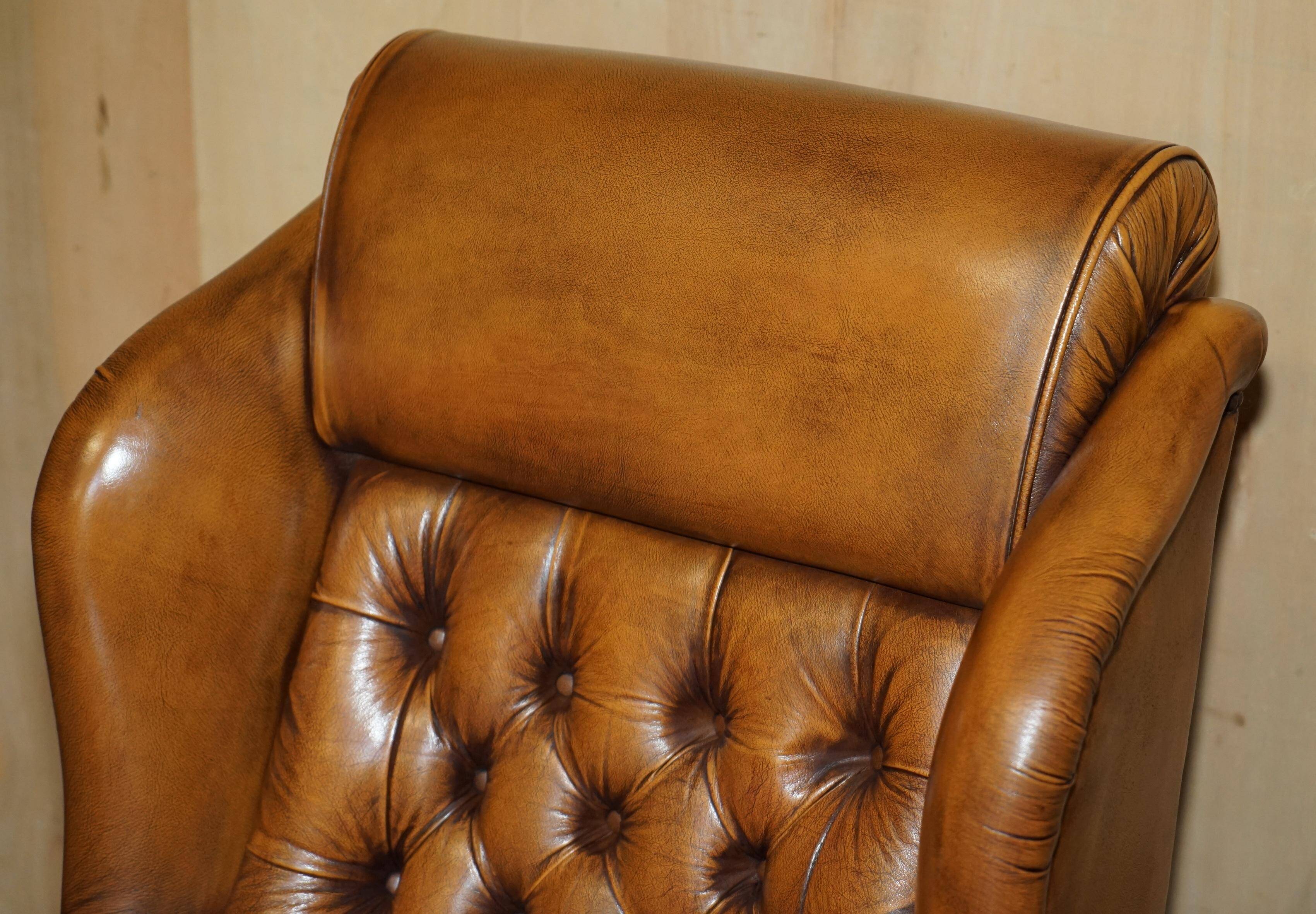 Captain's chair Chesterfield vintage leather with tufted wingback.