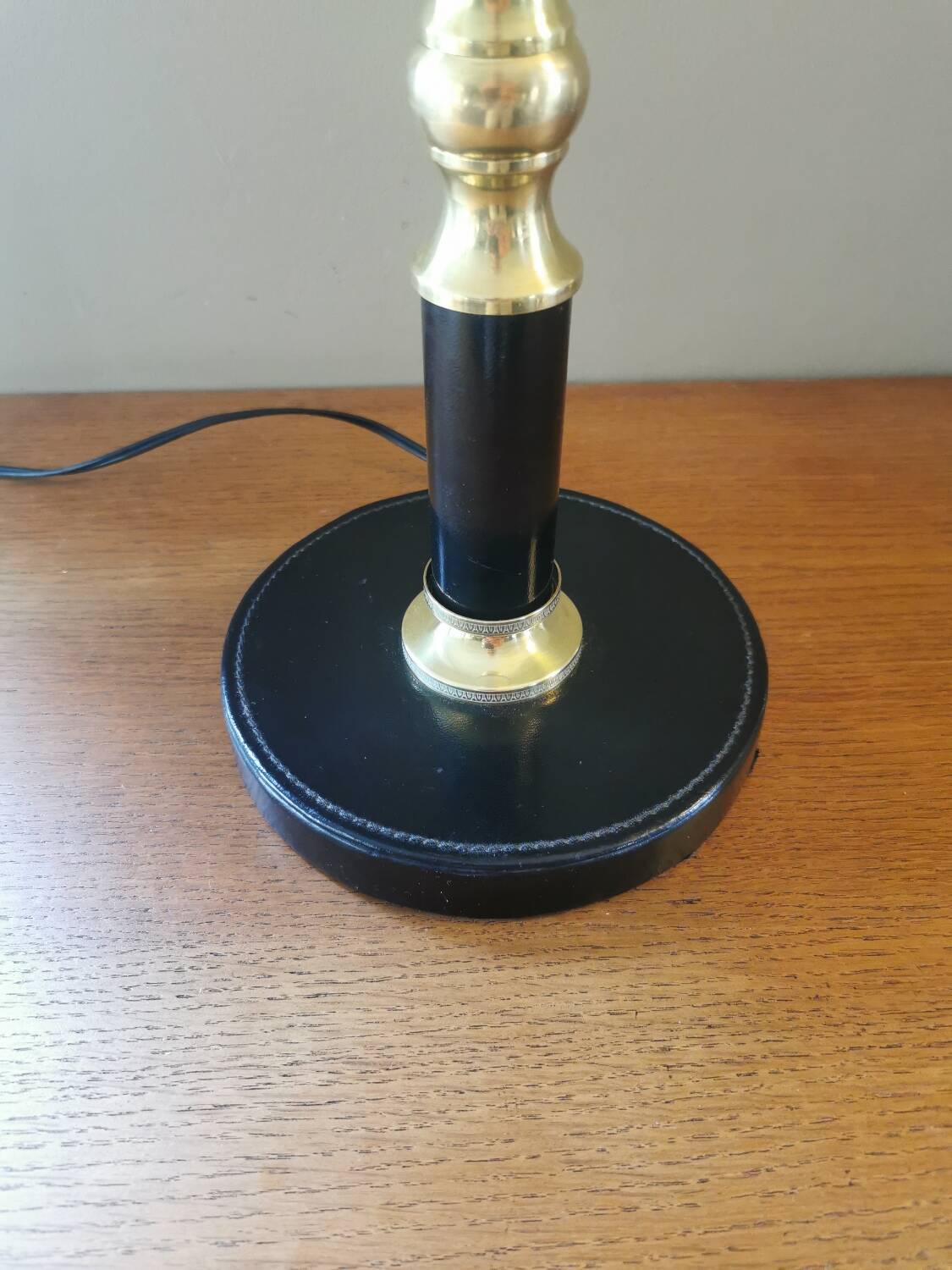 Vintage lamp base in black leather and brass