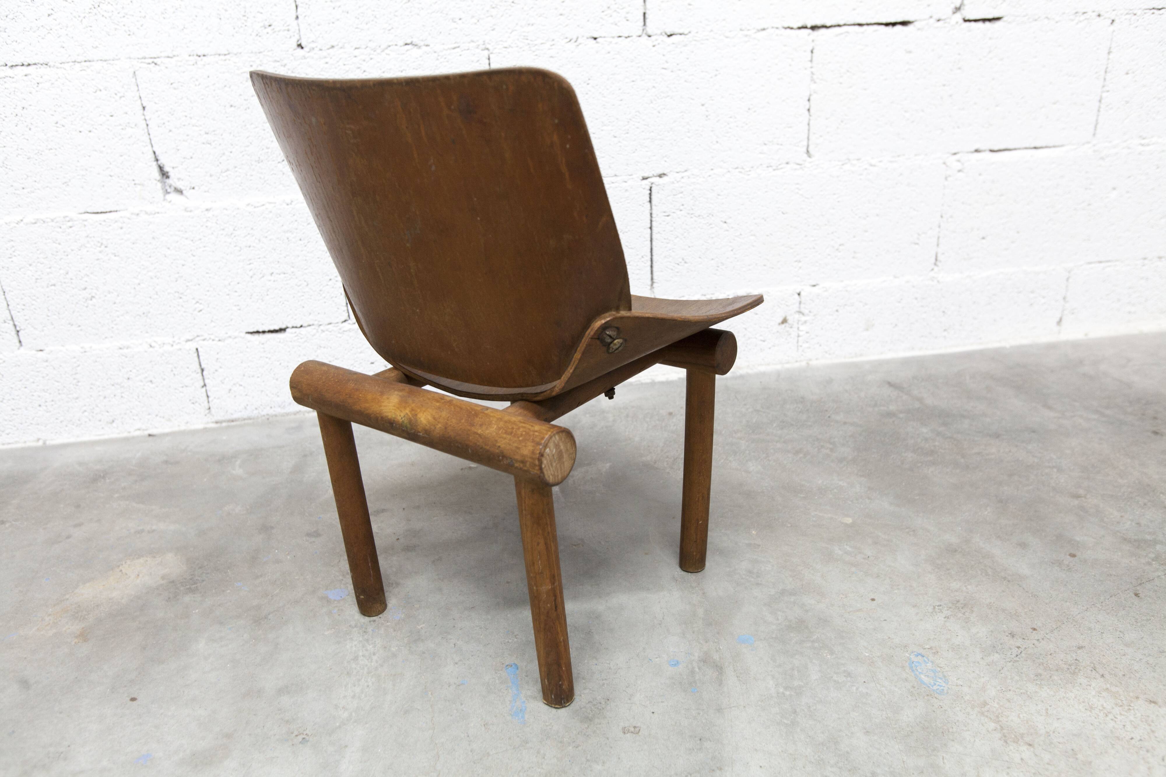 Atypical 1960s curved wood children's chair