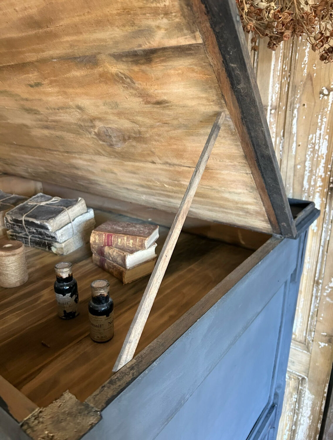 Old workshop drawer unit with a folding top.