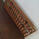 Vintage abacus made of light wood.