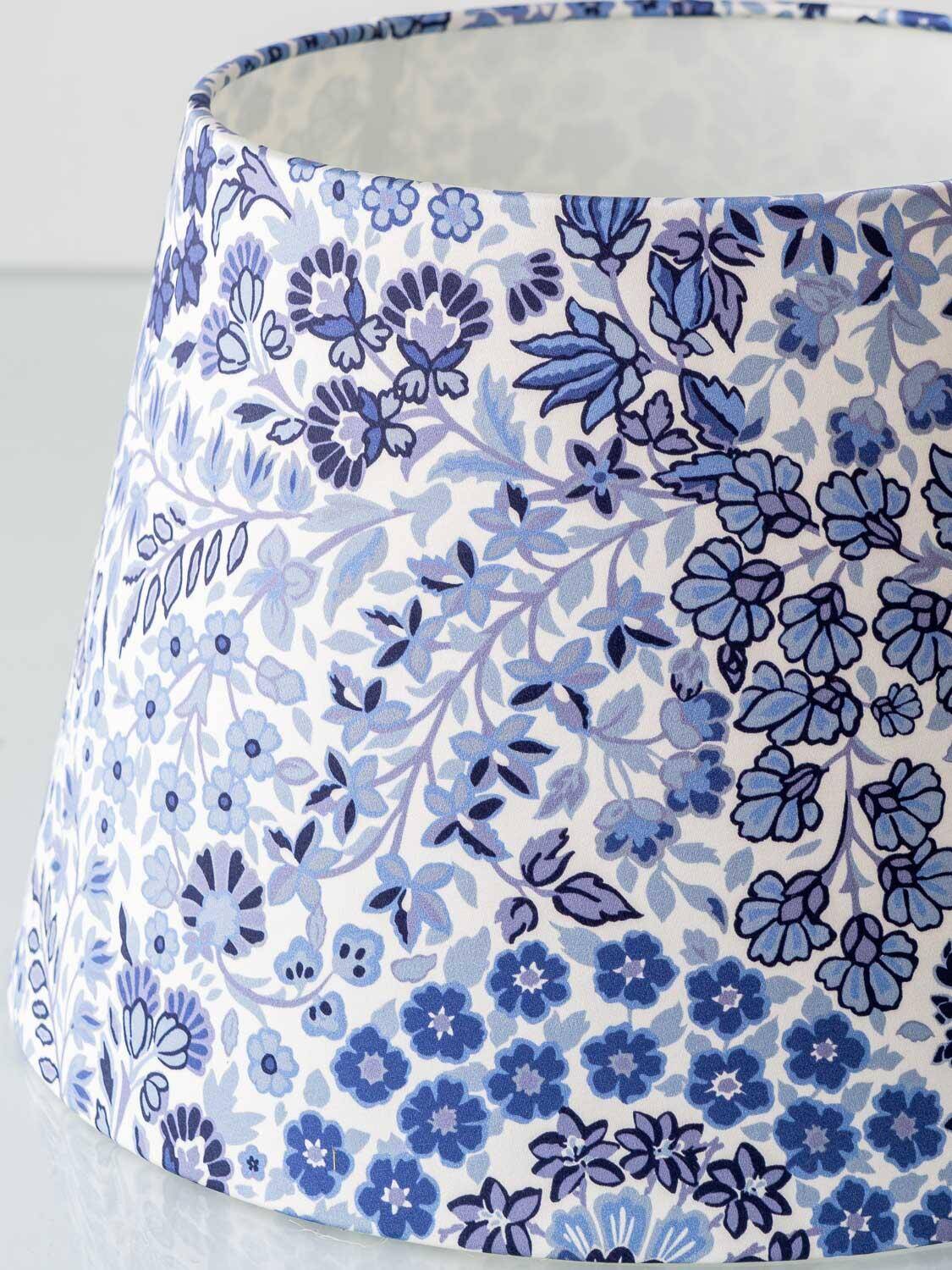 Mid-century modern blue ceramic table lamp with new Liberty London floral shade.