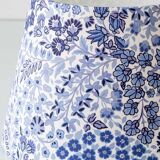 Mid-century modern blue ceramic table lamp with new Liberty London floral shade.