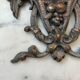 Vintage small furniture ornament in copper alloy with fish decoration.