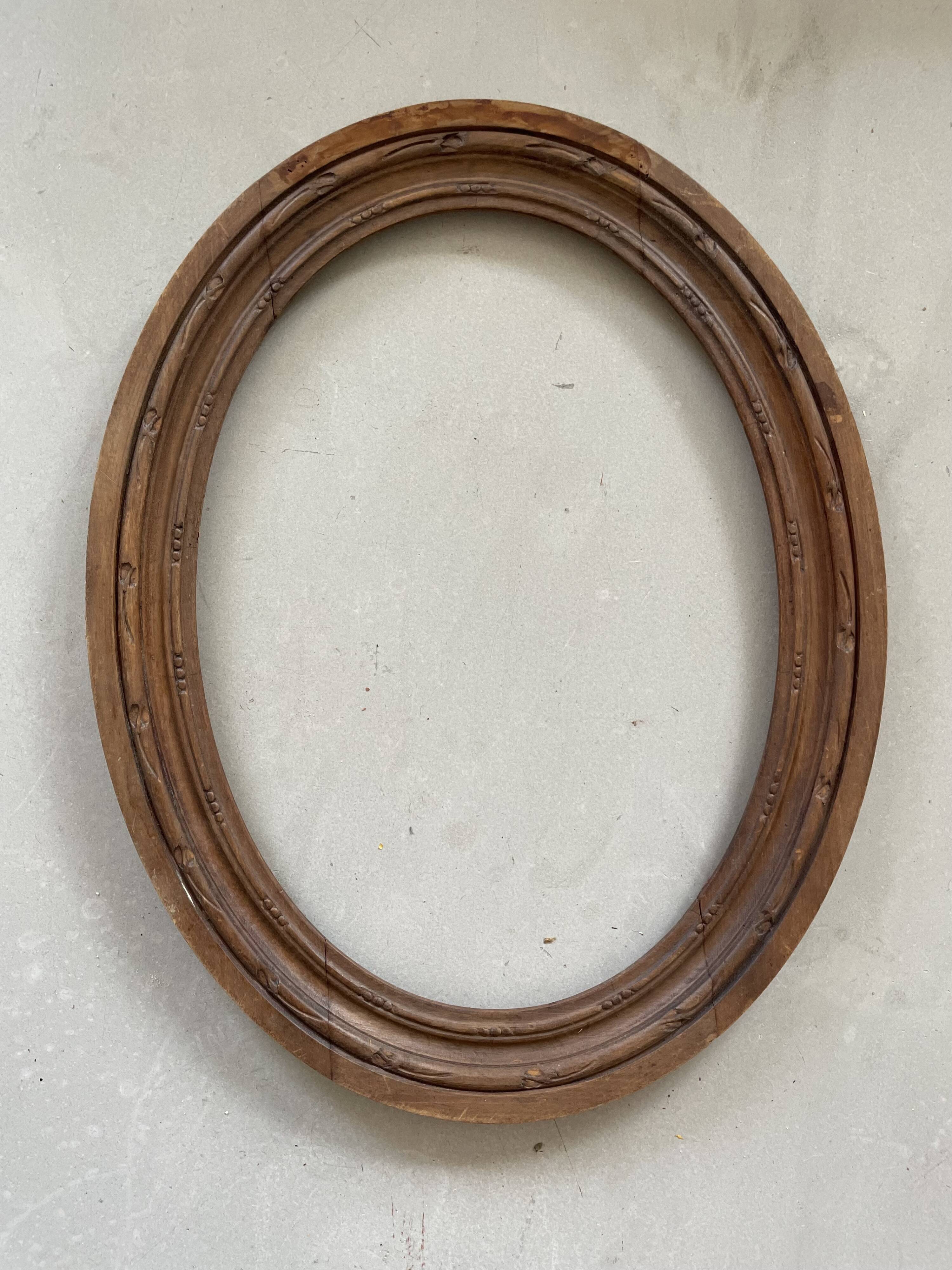 Oval old wooden frame