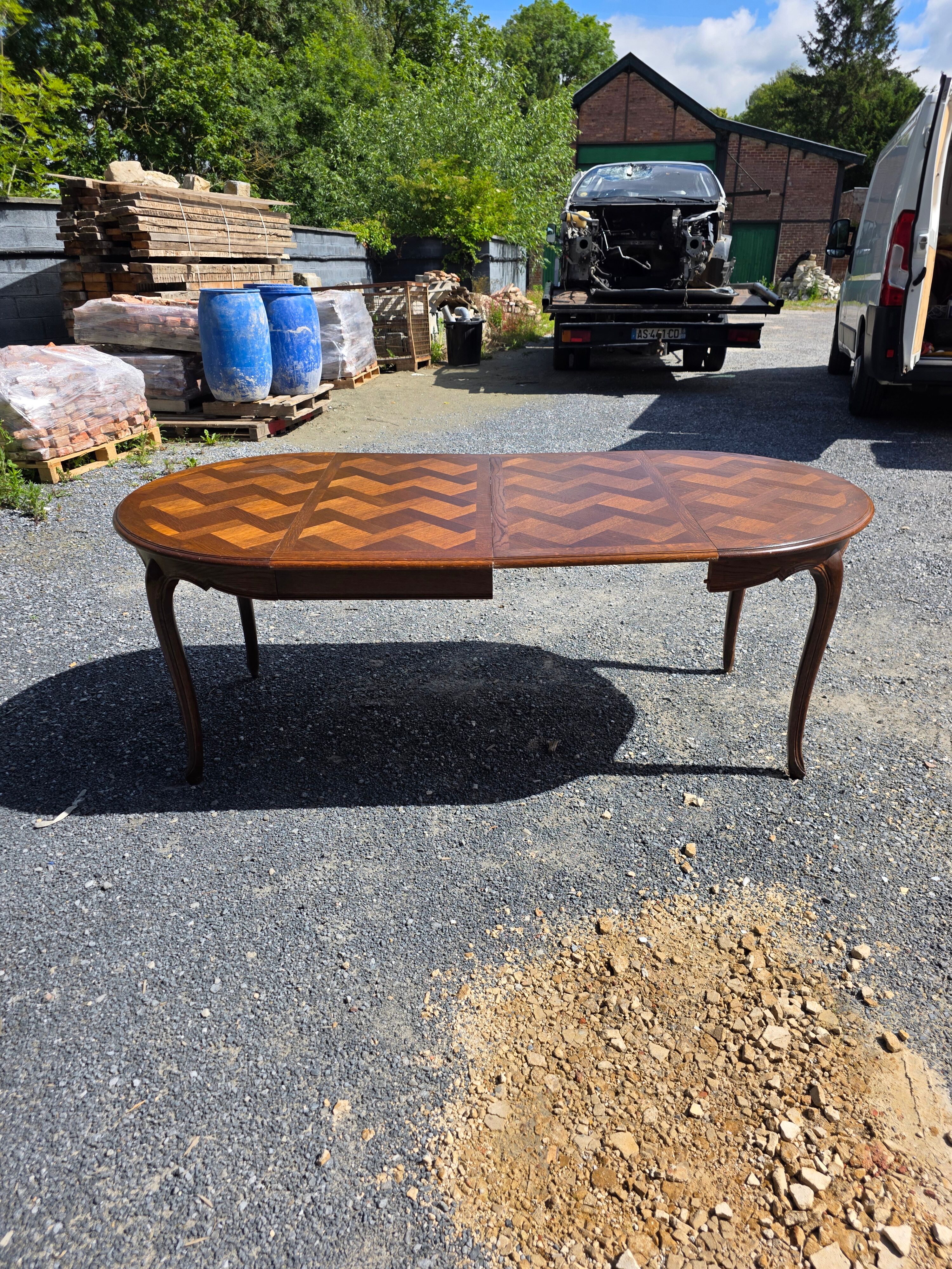 Extendable table in Louis XV style in oak (2 extensions)