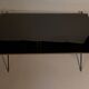 Coffee table in gilded brass, black metal and black opaline top, circa 1950