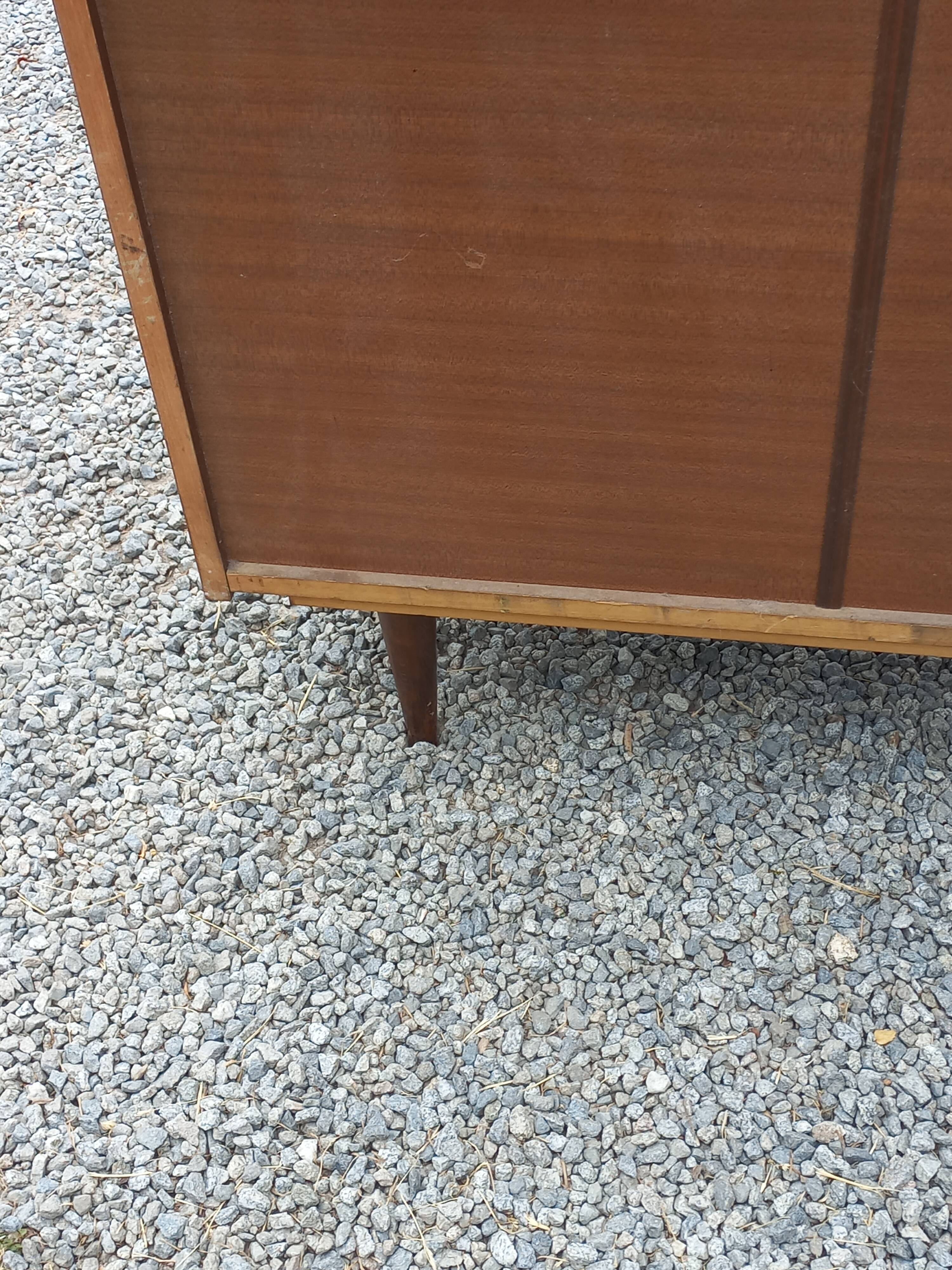 Vintage walnut varnished chest of drawers with 4 drawers from the 1960s.